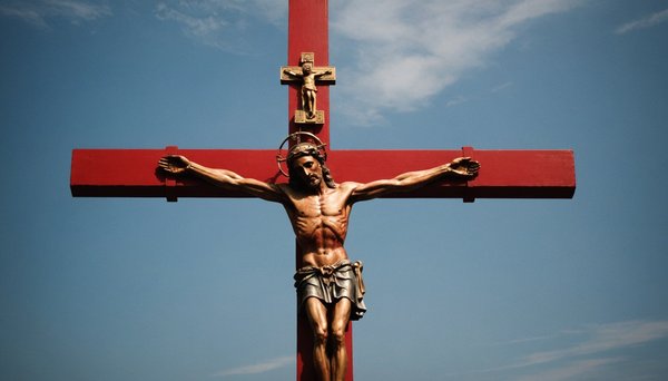 Discover the meaning behind the red crucifix of faith